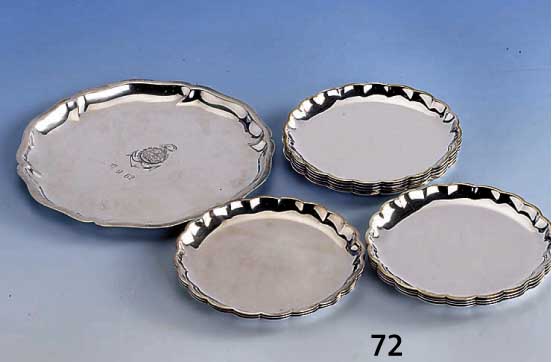 12 Glasuntersetzer, 1 Flaschenuntersetzer, total ca. 725 g, 835er Silber, Barockstil, Flaschenuntersetzer mit Bes.-Gravur, dat. 11.9.62, Durchm. ...