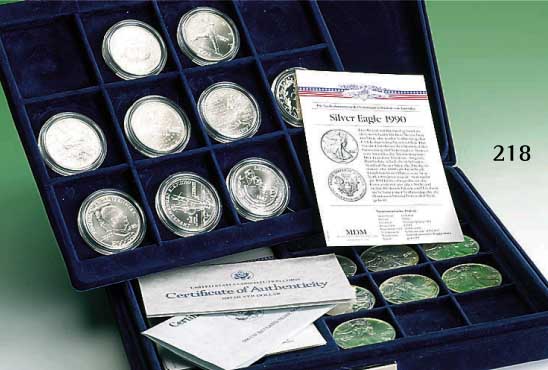 MÜnzen-Sammlung USA: 20 Silberdollar aus 1983- 1992, in sehr guter QualitÄt, meist mit Zertifikat in dekorativer, dunkelblauer Samt- schatulle