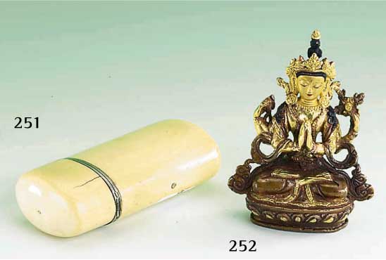 Buddha, Tibet 19. Jh., Gelbguß vergoldet, sogn. Manyushri (Gott der Barmherzigkeit), partiell vergoldet, in stiltyp. Manier, rot- schwarz ...