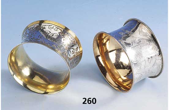 Konvolut 2 Serviettenringe, 1 x dat. 1865, 13-lÖtiges Silber, Monogr. WE, teilverg., grav. und punziert; 1 x um 1880/90, WMF, floral grav., ...