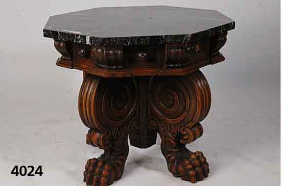Beistelltisch, deutsch, um 1890, Nußbaum, reich geschnitzt mit vollplastischen großen KlauenfÜssen, 8-eckige Marmorplatte, leicht best., H. ca. ...
