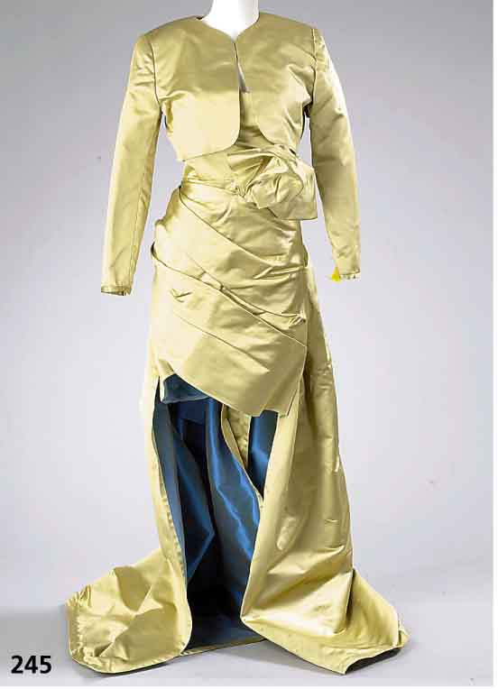 Abendminikleid m. Schleppe und Bolero, Gr. 38, PETER KEPPLER, goldfarb. Taftseide mit tÜrkisfarb. Innenfutter, trÄgerlos, einge- arbeitete ...