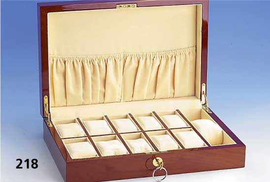 PrÄsentationsschatulle fÜr 11 Uhren, Edelholzfurnier mit Wurzelmaserung, abschließ- bar, ca. 7.5 x 31.5 x 21.5 cm