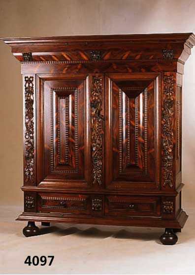 Kissenschrank, Holland um 1920, Korpus Eiche massiv, Palisanderfurnier gespiegelt, aufge- legte Schnitzereien LÖwenkÖpfe, Blumen und FrÜchte, ...
