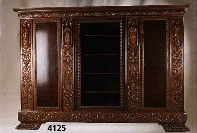 BÜcherschrank, deutsch, um 1928/35, Renais- sancestil, massiv gearbeitet, Buche, Weich- holz und Eiche, Bildhauerarbeit, Zarge, Kopf- kranz und ...