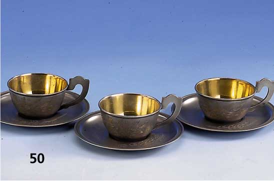 5 Moccatassen mit Untertassen, Moskau, 875er Silber, innenvergoldet, floral ver- ziert, ca. 480 g, um 1956/58, Meistermarke unged., H 4 cm, (SW ...