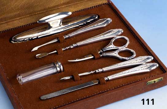 7-teil. Nagelnecessaire, deutsch um 1900, 800er Silber, Gebr.-Teile Metall, im Orig.- Etui