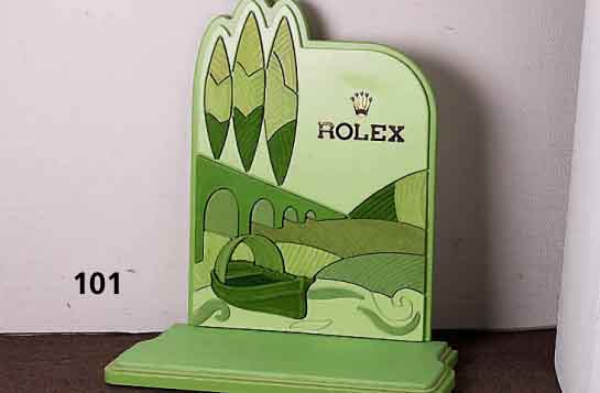 Schaufensterdekoration ROLEX, Kunststoffkorpus mit Stoffbezug in versch. GrÜntÖnen, 61 x 46 cm