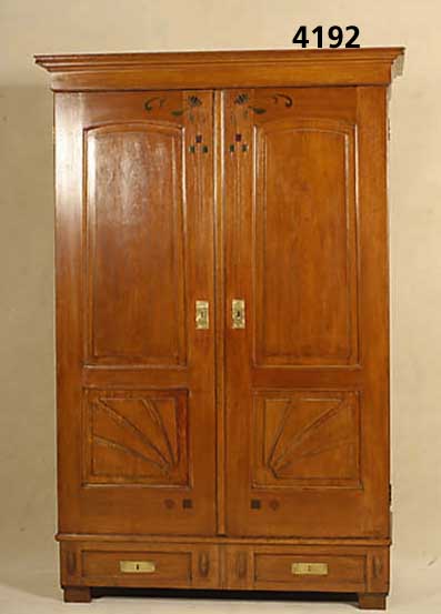 Schrank, deutsch, um 1910/20, Ulmefurnier, zweitÜrig, dekoriert mit gekerbter und colo- rierter Zierornamentik im Sinne des Jugend- stils, ...