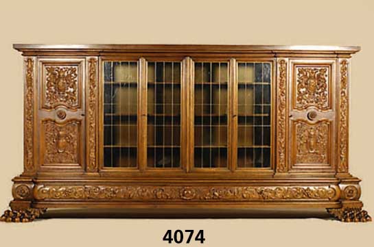 PrunkbÜcherschrank, deutsch, um 1960/65, Warrings, Modell Roland, Korpus Weichholz, Buche und Nußbaum massiv, Front mit reicher Bildhauerarbeit ...
