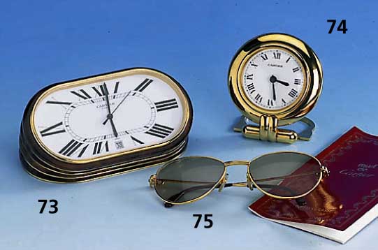 CARTIER-Reisewecker, Metall vergoldet, Quartzwerk, Batt. muß ers. werden, Serie Must de Cartier, orig. Etui und Papiere