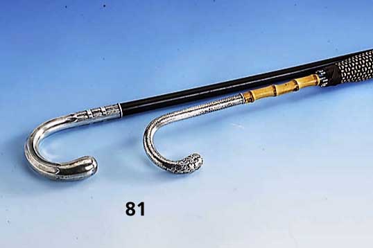 Konvolut Spazierstock und Schirm, deutsch um 1900, 800er Silber, Schuß geschwÄrztes Holz, Gebr.-Sp., L. ca. 83 bzw. 94 cm