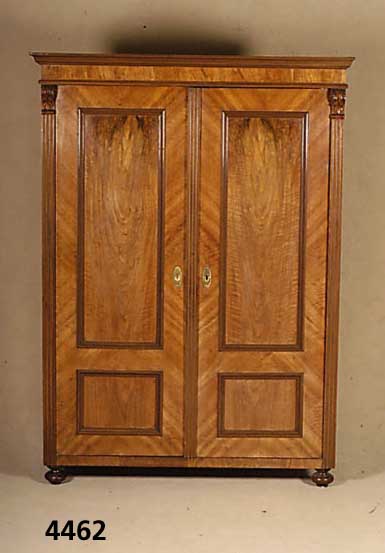 Schrank, wohl deutsch, um 1890, Nußbaumfur- nier, zweitÜrig, Alters- und Gebrauchsspuren, ohne SchlÜssel, ca. 169x130x57 cm