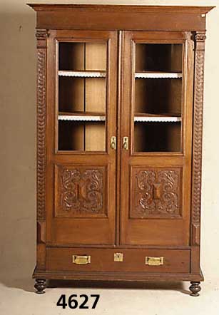 BÜcherschrank, deutsch, um 1880/90, Korpus Weichholz, Nußbaumfurnier, original BeschlÄge, Seite mit aufgesetzten Veluten und Baluster- ...