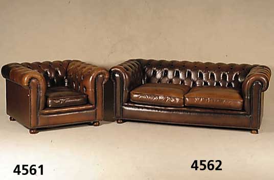 Chesterfield-Sessel, wohl England, 50er/60er Jahre, rÖtlich-braunes Leder von guter Qual- itÄt, RÜcken und Seiten genoppt und geheftet, lose ...