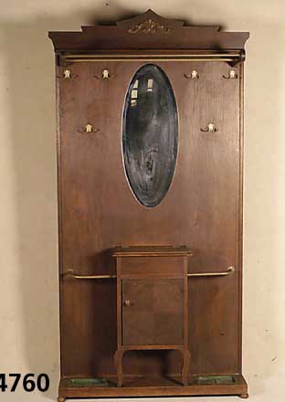 Wandgarderobe, deutsch, um 1910, Eiche fur- niert, Ablabe und Handschuhfach, facettiert gespiegelt, Altersspuren, ca. 206x105x29 cm