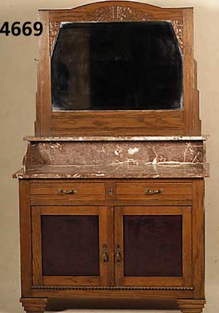 Spiegelkommode, deutsch, um 1910/20, ArtDeco , Eiche massiv, mit floraler Schnitzerei, facettierter Spiegel, Marmoraufbau, TÜrfÜl- lungen mit ...