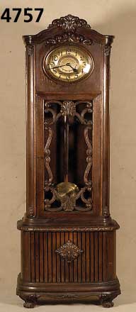 Standuhr, deutsch/Schwenningen, um 1900, Fa. Mauthe, Eiche massiv, Eichefurnier, viele geschwungene Schnitzereien, Giebel geschwungen mit ...