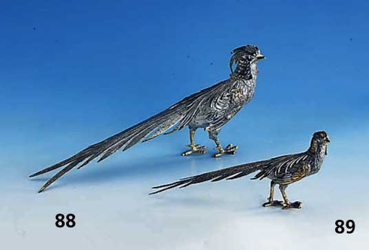 Silberfigur in Form eines Fasanes, Hanau um 1900, Silber teilvergoldet, berieben, vollplastische Darst., H ca. 11 cm, L ca. 26 cm