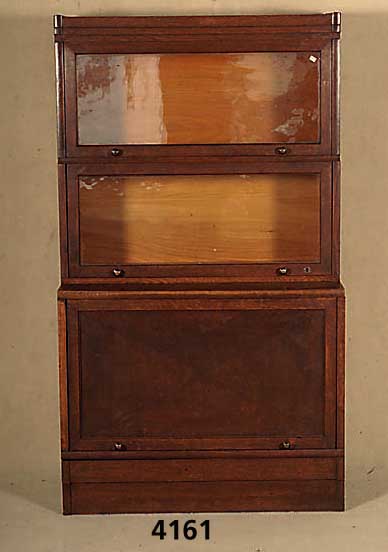 BÜcherschrank, Berlin, um 1910, Korpus Weichholz, Eichefurnier, einzelne FÄcher auf- klappbar, ca. 150x86x43 cm, ohne SchlÜssel