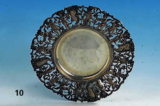 Anbietteller, deutsch um 1900, 800er Silber, Rand mit Durchbrucharbeit in Form von Putti, Instrumenten und floralem Dekor, ca. 335 g, D ca. 23 cm