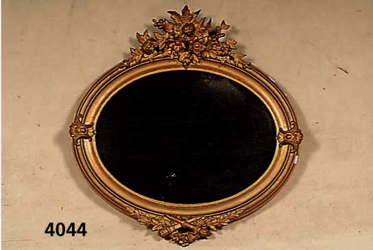 Spiegel, deutsch, um 1870/80, Holz gestuckt, ursprÜnglich vergoldet, hier bronziert, Spiegelglas minimal beschÄdigt, ca. 77x75 cm