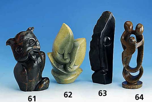 Skulptur aus Serpentingestein "Eule", kÜnstlerische Handarbeit, rot-braun marmorier- tes Gestein in Darstellung einer Eule, H. ca. 25 cm