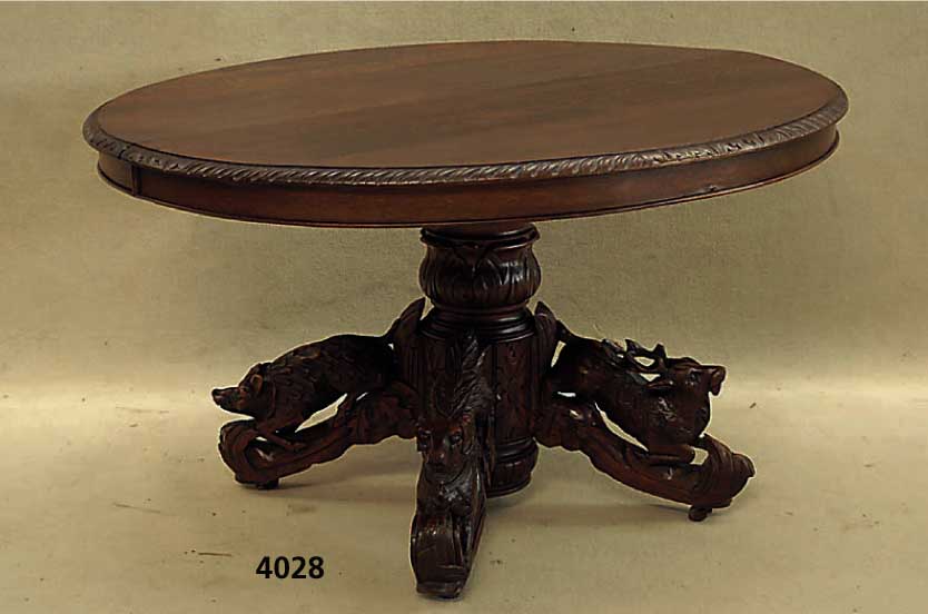 Großer Ausziehtisch, Frankreich, um 1860/70, Eiche massiv, ovale Arbeitsplatte mit ge- schuppter Umrandung, SÄulenfuß 4-fach aus- ladend, diese ...