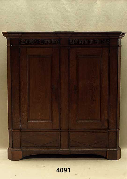 Brautschrank, deutsch, datiert 1838, wohl Westfalen, Eiche massiv, StollenfÜße, abge- schrÄgte Ecken, Kopfleiste 3-fach gestuft, TÜren mit ...