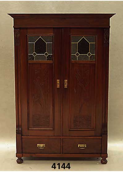 Schrank, deutsch, um 1900, aus verschiedenen ObsthÖlzern, nußbaumfarben, Kopfleiste spÄter , TÜren mit Flachschnitzereien, Oberteil mit ...