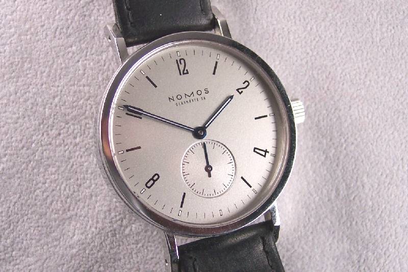 NOMOS Designerherrenarmbanduhr, Modell Tangente Sport, Deutschland lt. beil. Orig.- Etui u. Papieren m. Herkunftsnachw. 2002, Edelst. pol., Boden ...