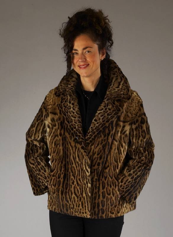 Ozelot-Jacke, Gr. ca. 40, gerader Schnitt, angesetzte Ärmel, 2 Einschub- taschen, gekauft 1972 fÜr DM 3800.-, RÜckenl. ca. 67 cm, mit ...