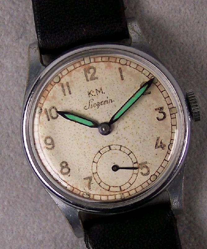ALPINA/SIEGERIN MilitÄr-Armbanduhr von Mark Favre, fÜr die dtsch. Kriegsmarine Anfang 40er Jahre, Metallgeh. verchromt, Edelst. Bod. u. Glasrd. ...