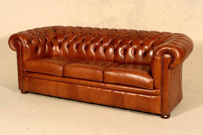 3-sitzer Sofa, wohl England, Chesterfieldstil, lose Kissen, RÜcken und Seiten genoppt und geheftet, braunes Leder von guter QualitÄt, ...