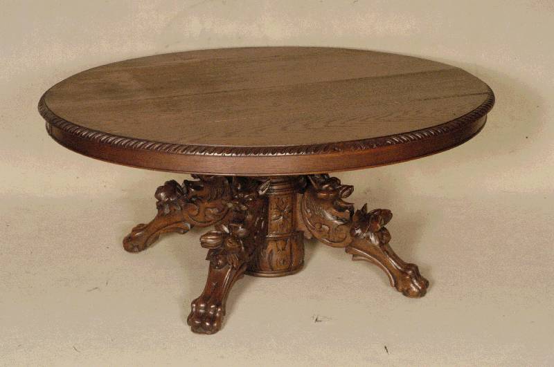Ovaler Couchtisch, Frankreich, um 1860/70, Eiche massiv, ovale Arbeitsplatte mit geschuppter Umrandung, SÄulenfuß 4-fach ausladend, diese ...