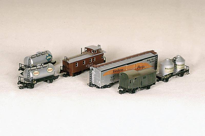 Konvolut GÜterwagen, MÄrklin, 50er/60er Jahre, Spur HO, Offener u. gedeckter GÜterwagen 4602 u. 4506, Stammholzwagen 3132/H, 2 Niederbordwagen 1 ...