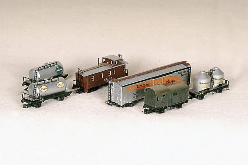 Konvolut GÜterwagen, MÄrklin, 50er/60er Jahre, Spur HO, Niederbordwagen 4503, offener GÜterwagen 3111, GÜterzug GepÄckwagen 3101, ...