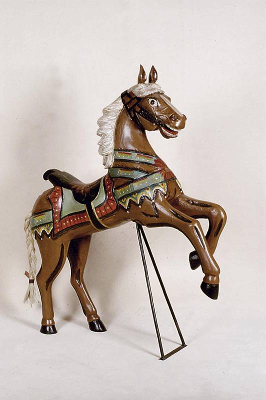 Karusselpferd, 70er/80er Jahre, Teakholz massiv, in den 90er Jahren restauriert und neu bemalt, H. ca. 58 cm, L. ca. 66 cm