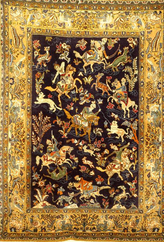 Ghom, Persien, ca. 50 Jahre, Flor Wolle mit Seide, ca. 195 x 142 cm, Schätzwert: 2500.- EURO, EHZ: 2. Jagdszenerie auf Dunkelblauen Fo nd. Sehr gut ...
