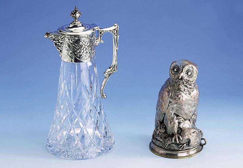 Dekantierkanne, Korpus Kristallglas, Montur 925er Silber, reicher BlÜten-Dekor, Griff mit Maskeron, Deckel mit Scharnier, H. ca. 28 cm