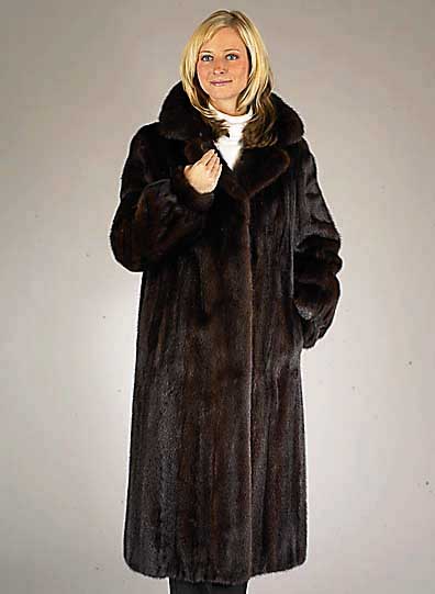 Nerzmantel, Gr. 42/44, dunkle Felle, schwarzes Innenfutter (ausgerissen), Kragen, 2 seitl. Einschubtaschen, Manschetten, RÜckenl. ca. 116 cm