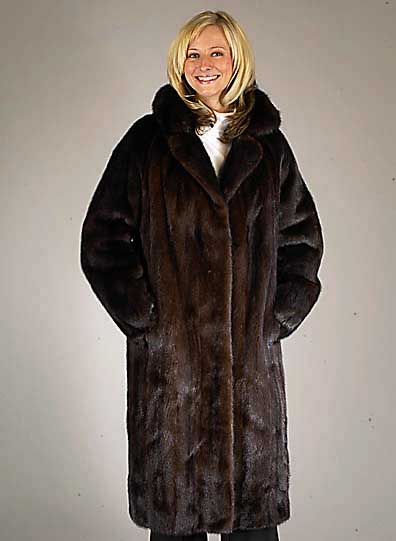 Saga-Mink-Nerzmantel, Gr. 40, dunkelbraune Felle, dunkelbraunes Innenfutter, Kragen, 2 seitl. Einschubtaschen, RÜckenl. ca. 107 cm