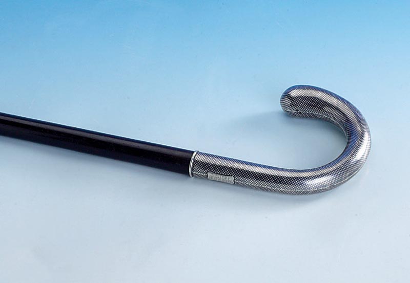 Spazierstock, wohl Berlin um 1900, Knauf 800er Silber, quadr. tauschiert, Namensnennung J Stiepe. Fredeburg, Schuss aus Makasar, schwarz gelackt, ...