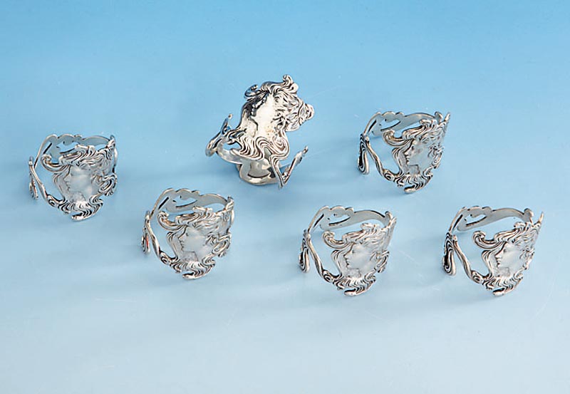 6 Jugendstil-Serviettenringe, deutsch um 1900, reiner Jugendstil, 800er Silber, typ. Jugenstilmotiv: MÄdchenkopf mit wallendem Haar in Reif ...