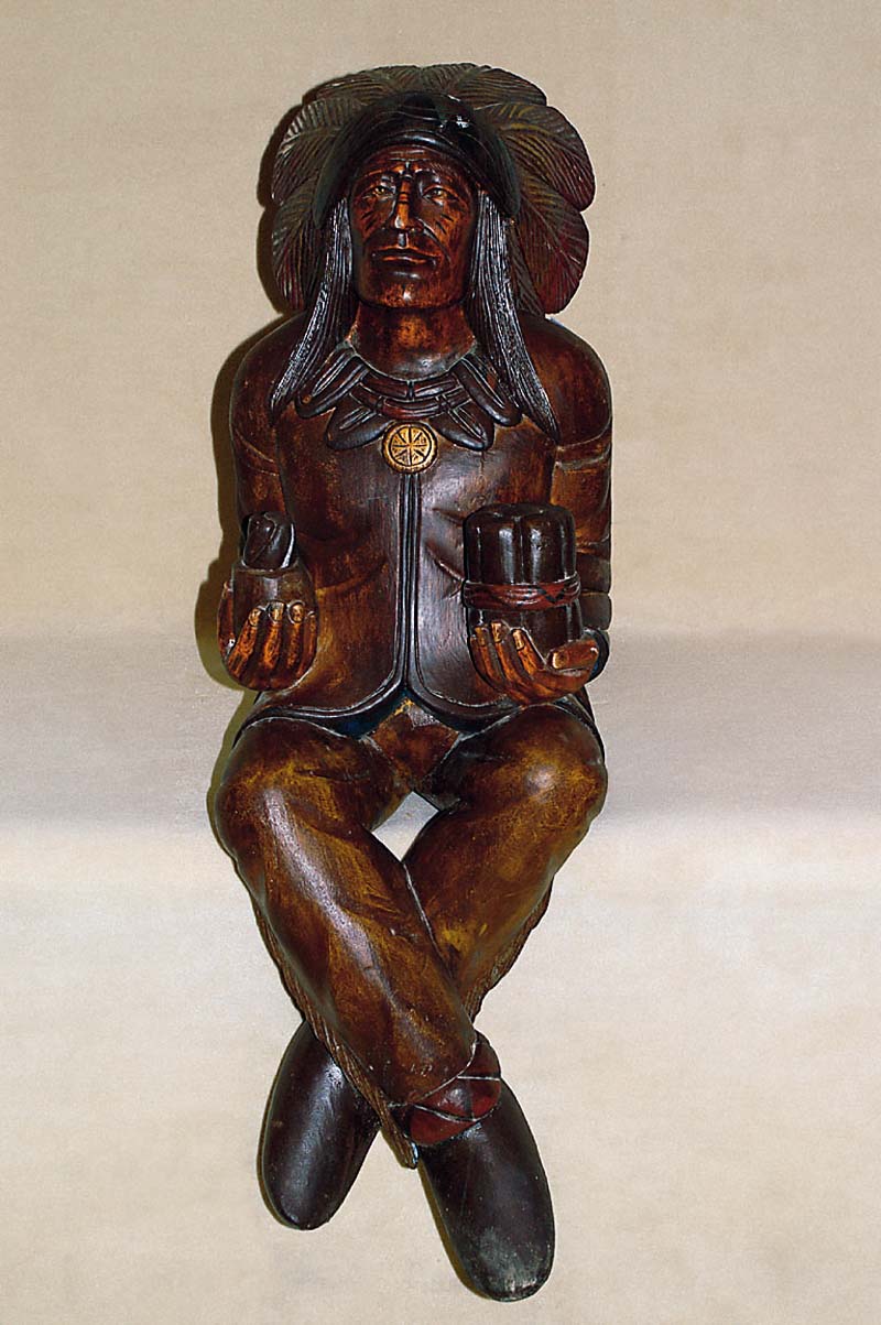 Karusselfigur, 2. HÄlfte 20. Jh., sitzender Indianer, aus dem Vollholz geschnitzt, l. Gebrauchsspuren, 103 x 34 cm