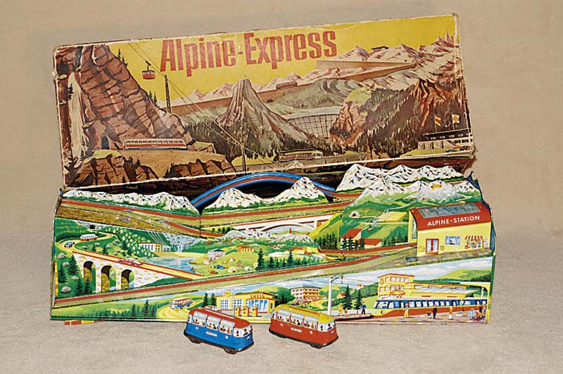 Technofixbahn, Alpine-Express, 60er Jahre, Blech, bunt lithographiert, mit 2 Fahrzeugen, beide intakt, mit orig. SchlÜssel, fast unbespielt, im ...