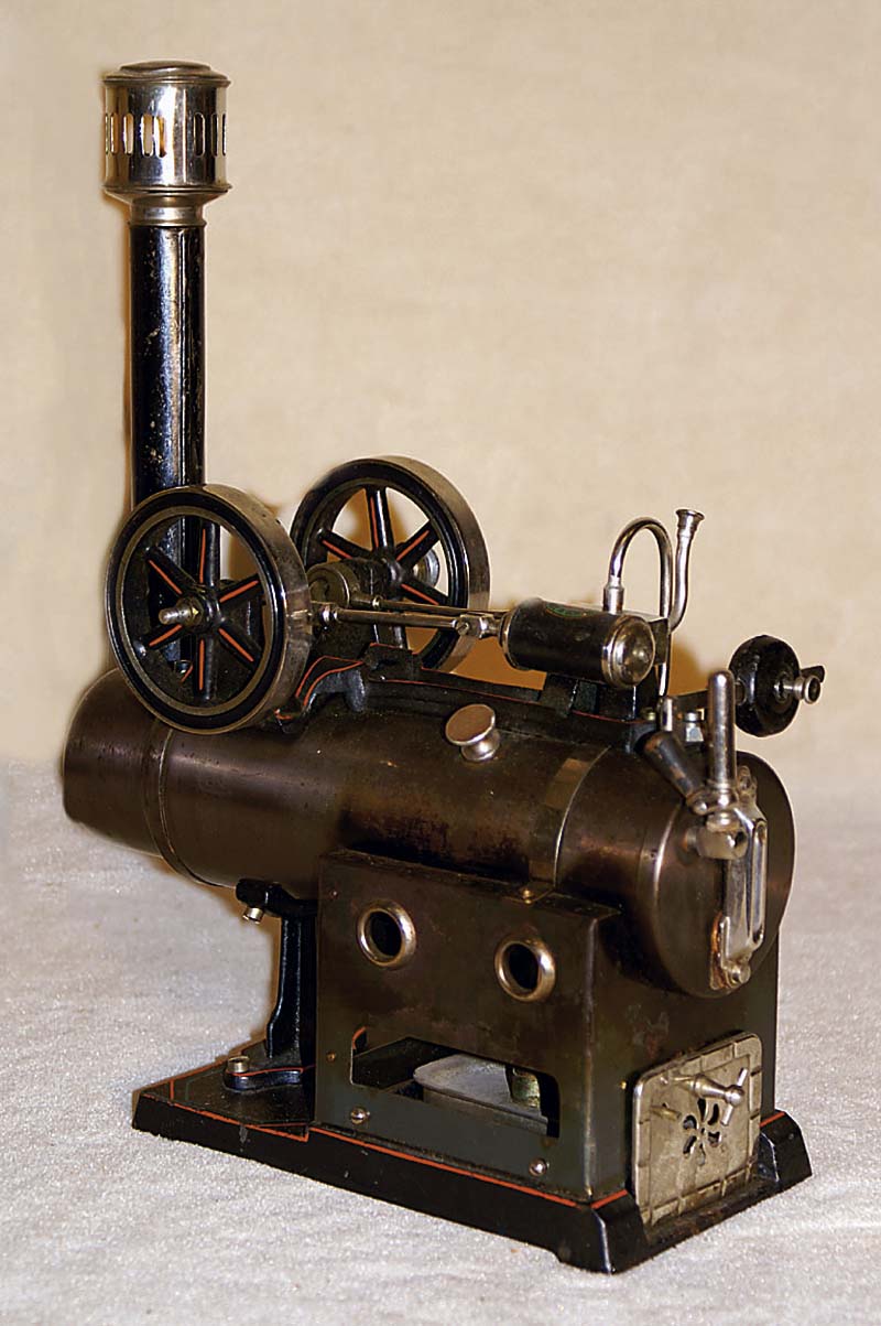 Dampflokomobil, Firma Doll, um 1910/20, GußausfÜhrung, mit 2 Antriebsfedern, sehr frÜhe AusfÜhrung, sehr guter Zustand, min. bespielt, alle ...