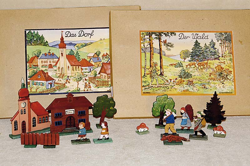 Holzspielzeug, Erzgebirge, 30er Jahre, "Das Dorf", unbespielt, im orig. Karton, Teil einer Serie best. aus 6 versch. KÄsten, ...
