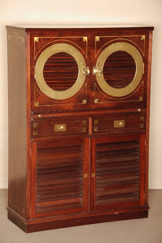 Mehrzweckschrank, deutsch, um 1960, Schiffsmodel, Korpus Weichholz, z.T. Tischlerplatte, Palisanderfurnier, bullaugenfÖrmige FÜllungen aus ...