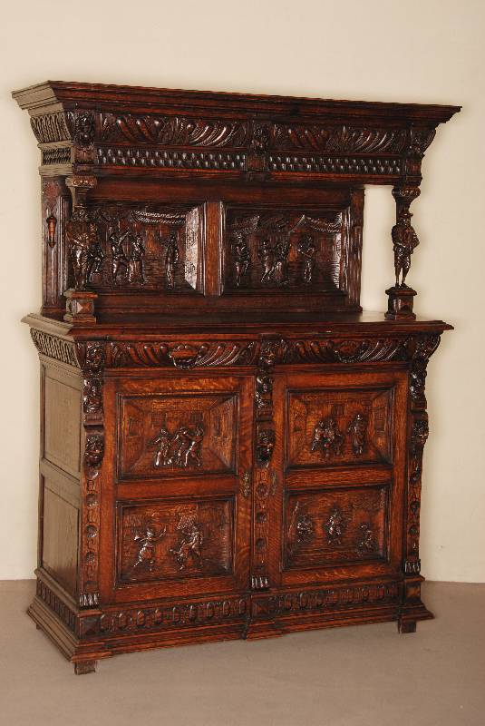 Aufsatzschrank, Flandern, um 1870, Eiche massiv, Unterteil 2-tÜrig, FÜllungen mit volkstÜmlichen Darstellungen, Oberteil getragen von ...